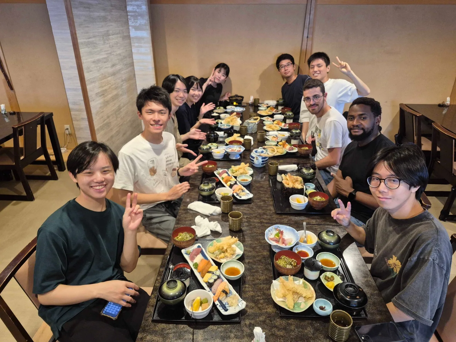 SIONA Technologies global field note from Japan showing collaborators sharing a meal